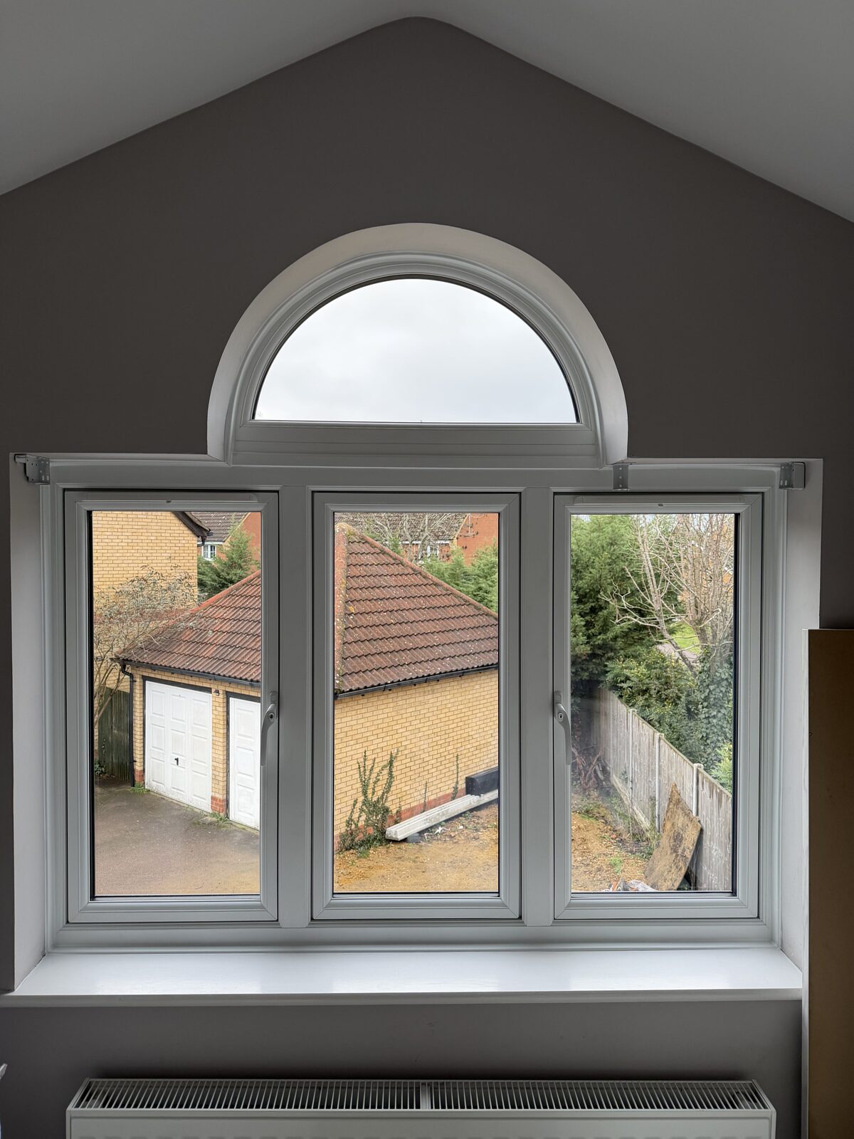 Grey windows with feature arch